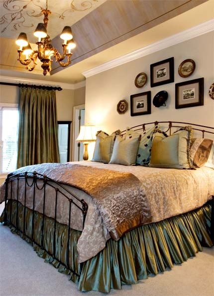 Large transitional master carpeted bedroom photo in Charlotte with beige walls and no fireplace