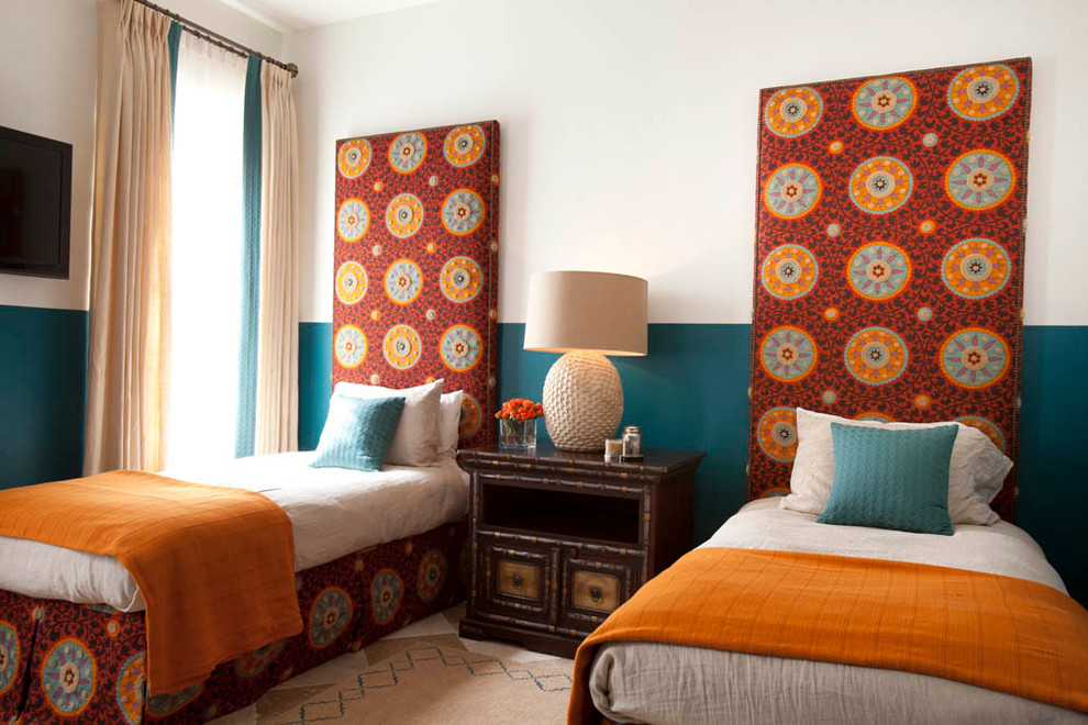 Inspiration for a mediterranean bedroom remodel in Houston with multicolored walls