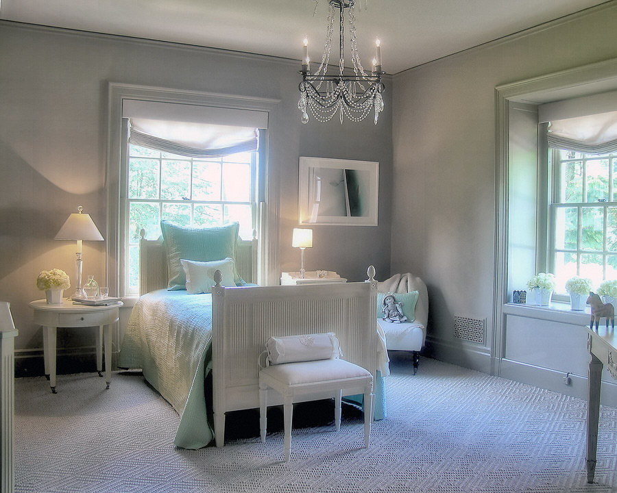 Inspiration for a large timeless guest carpeted bedroom remodel in New York with gray walls