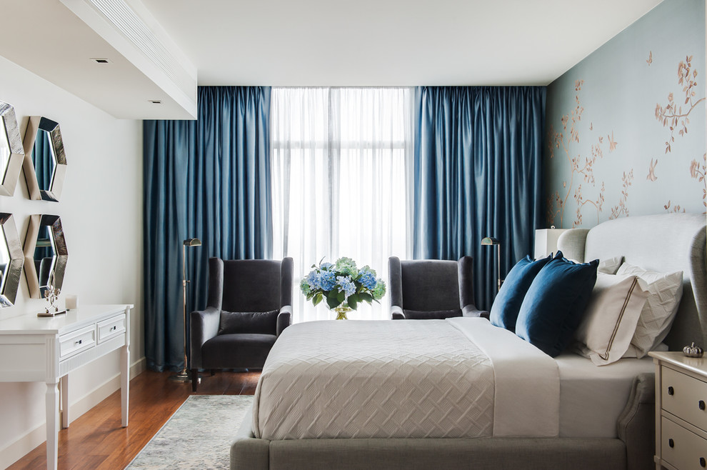 Example of a transitional dark wood floor bedroom design in Melbourne with white walls