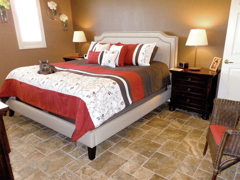Mid-sized southwest guest ceramic tile bedroom photo in Phoenix with beige walls and no fireplace