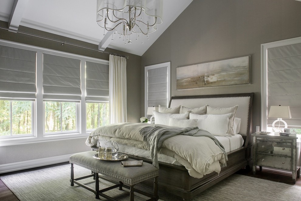 Inspiration for a large classic master bedroom in New York with grey walls, medium hardwood flooring and no fireplace.