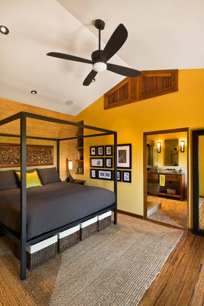 Bedroom - asian master medium tone wood floor bedroom idea in Santa Barbara with beige walls