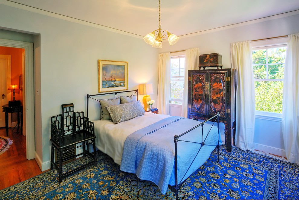 Foto de dormitorio de estilo zen con paredes azules