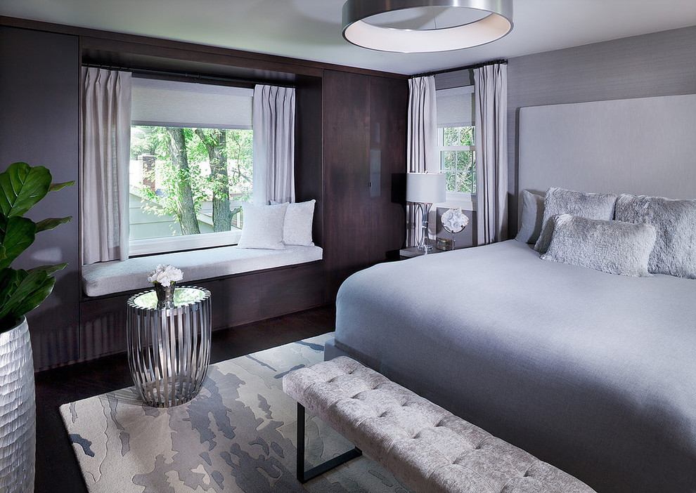 На фото: хозяйская спальня среднего размера в стиле ретро с серыми стенами, темным паркетным полом и коричневым полом без камина с