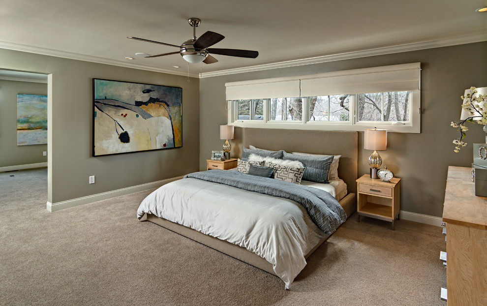 Design ideas for a traditional master bedroom in Minneapolis with carpet.