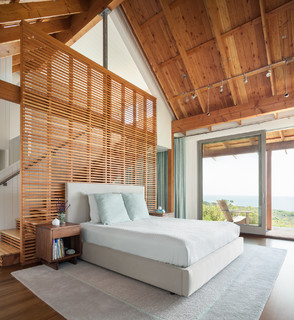 75 Beautiful Loft Bedroom with Dark Hardwood Flooring Ideas and