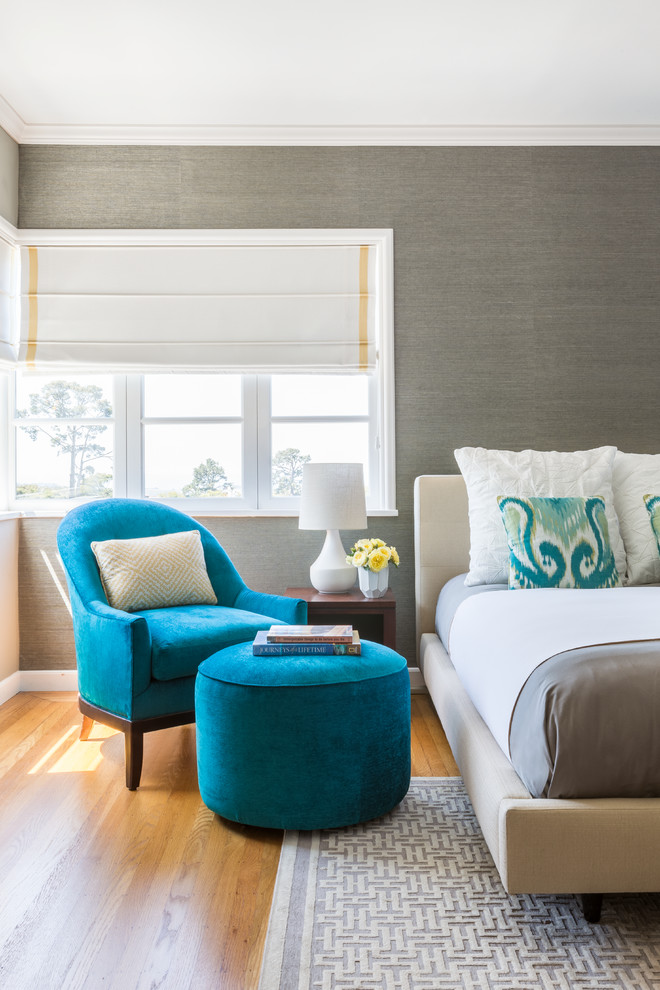 Example of a mid-sized trendy master light wood floor and beige floor bedroom design in San Francisco with gray walls