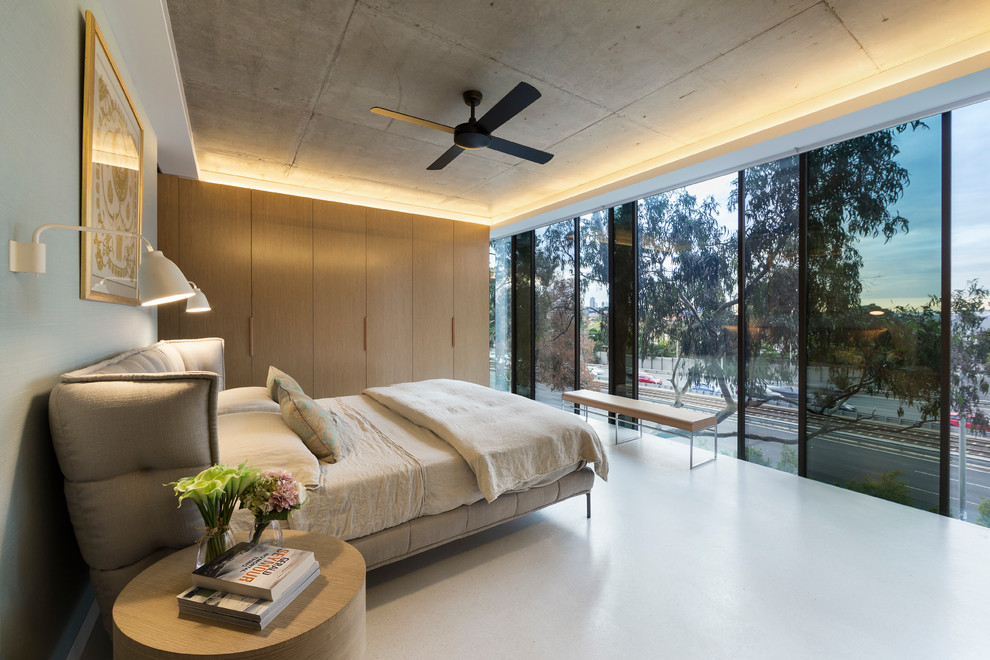 Photo of a contemporary master bedroom in Melbourne.