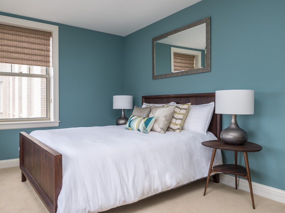 Mid-sized trendy guest carpeted bedroom photo in New York with blue walls