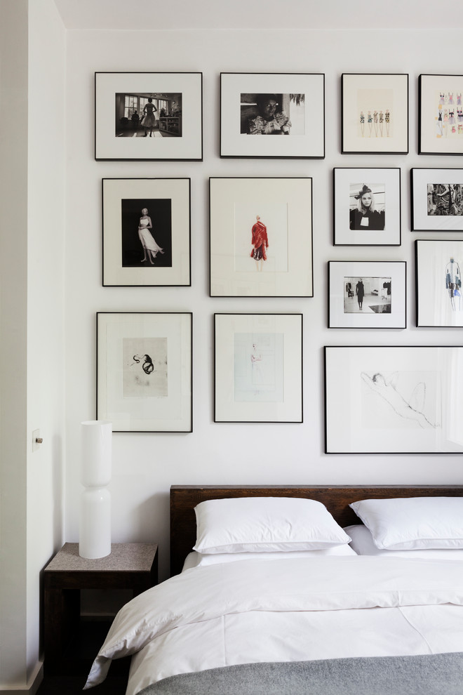 Bedroom - scandinavian bedroom idea in London with white walls