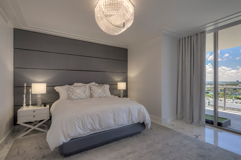 Bedroom - contemporary marble floor bedroom idea in Miami