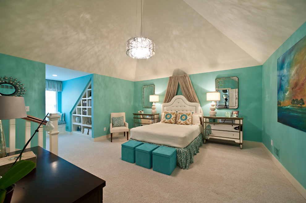 This is an example of a classic bedroom in Louisville with blue walls and carpet.