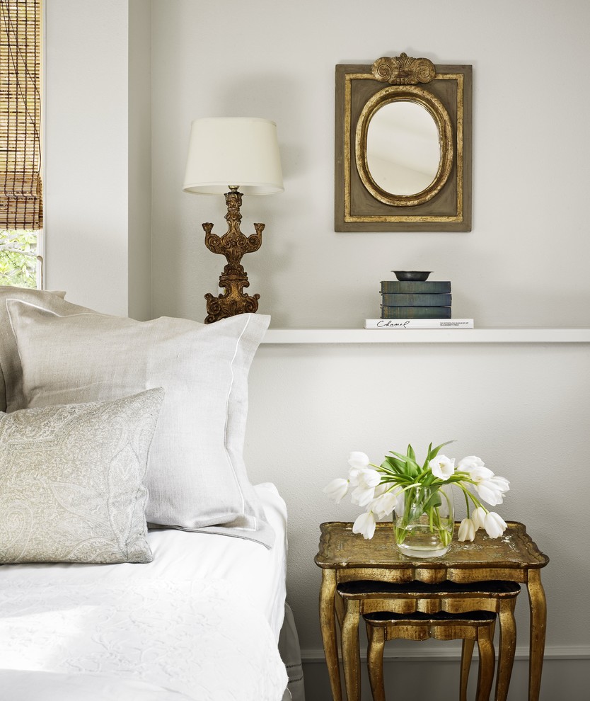 Inspiration for a shabby-chic style bedroom remodel in Austin with white walls