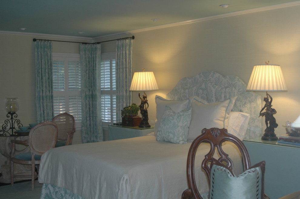 Classic master bedroom in Atlanta with blue walls and carpet.