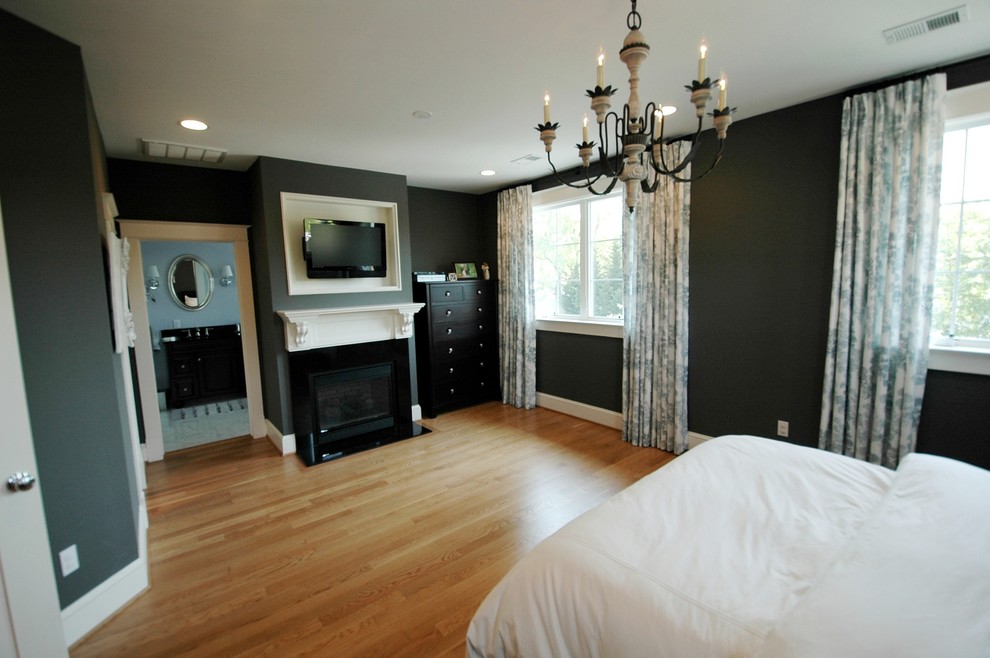 Large transitional master light wood floor bedroom photo in DC Metro with gray walls, a standard fireplace and a stone fireplace