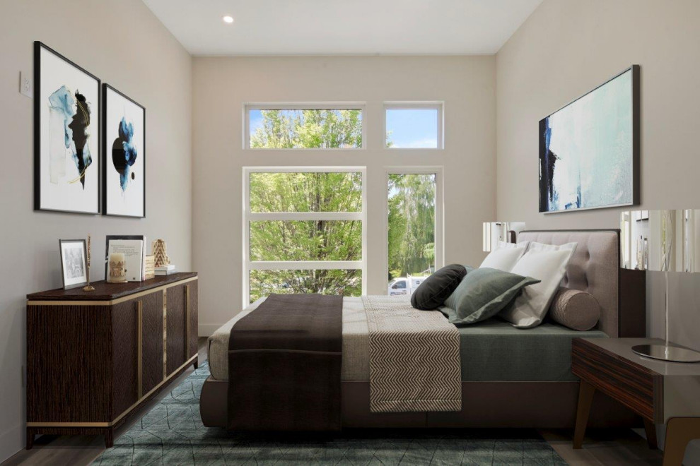 Idées déco pour une chambre parentale moderne de taille moyenne avec un mur blanc, sol en stratifié et un sol marron.