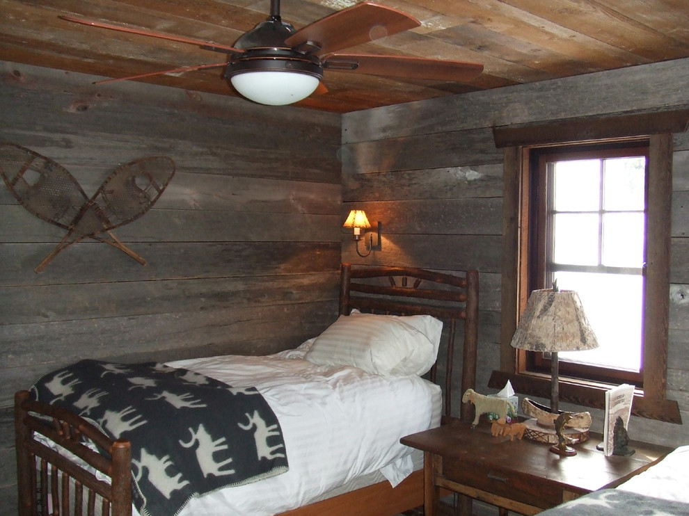 Inspiration for a rustic bedroom remodel in Minneapolis with gray walls