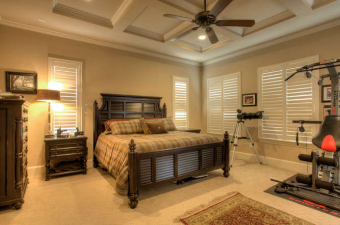 Example of a tuscan bedroom design in Austin