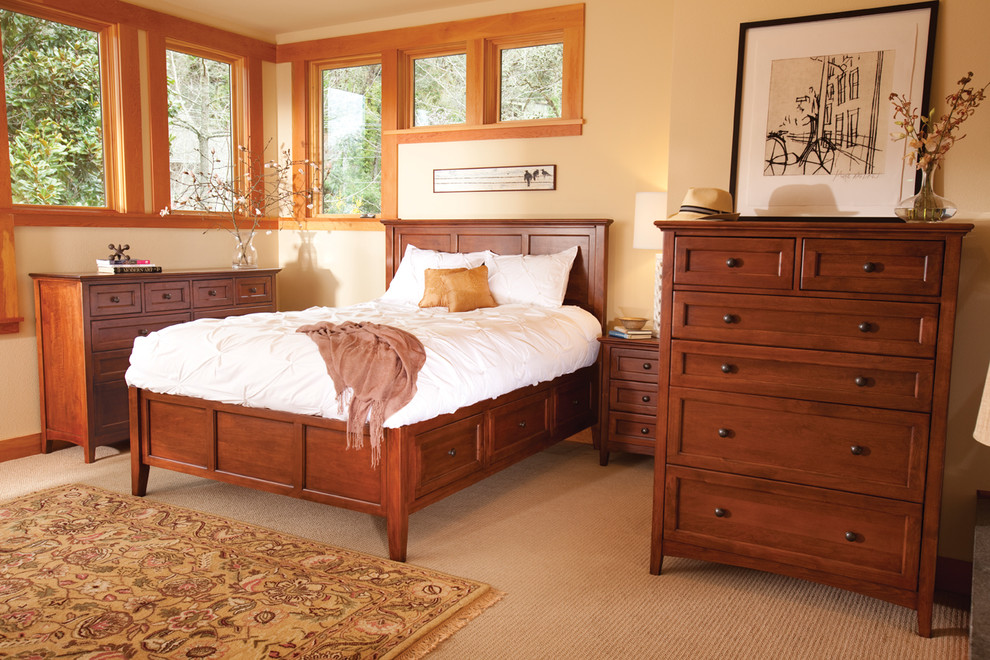 Design ideas for a classic bedroom in Orange County with beige walls, carpet and no fireplace.