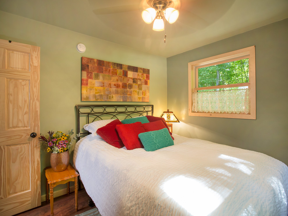 Bedroom - rustic bedroom idea in Omaha