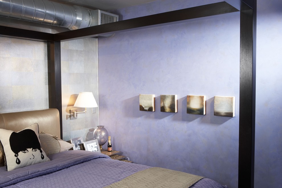 Design ideas for a small industrial grey and purple bedroom in Phoenix with purple walls and a feature wall.