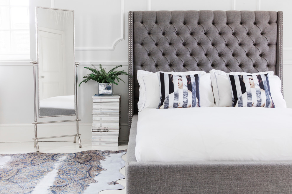 Bedroom - contemporary master bedroom idea in Sussex with gray walls