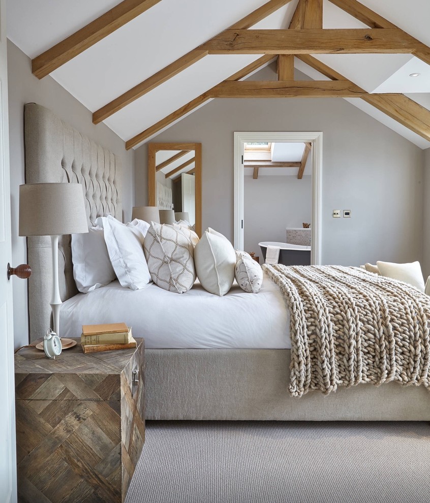 Example of a country carpeted bedroom design in San Francisco with gray walls