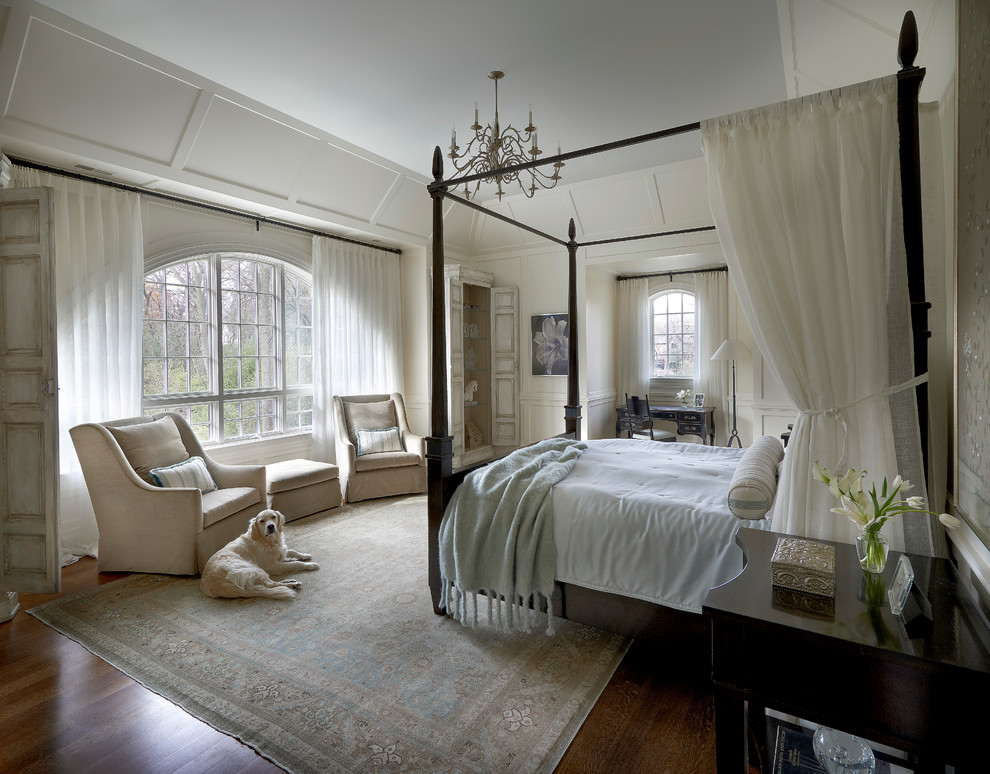 Large transitional master medium tone wood floor bedroom photo in Chicago with white walls and no fireplace