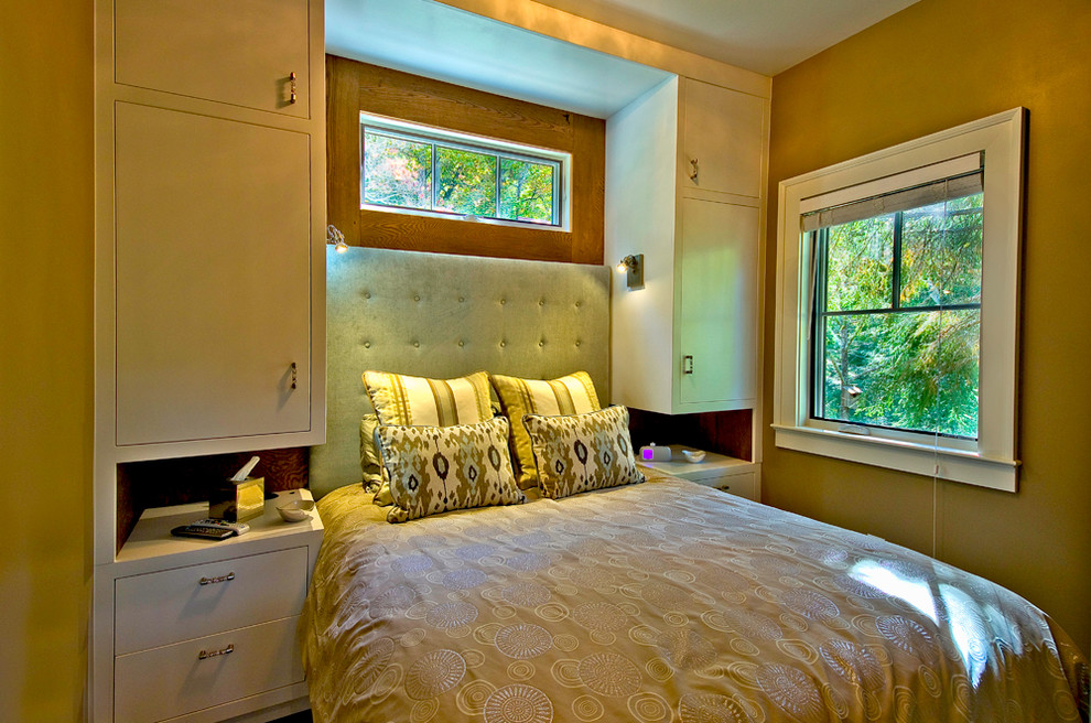 Inspiration for a small traditional master bedroom in Other with brown walls.