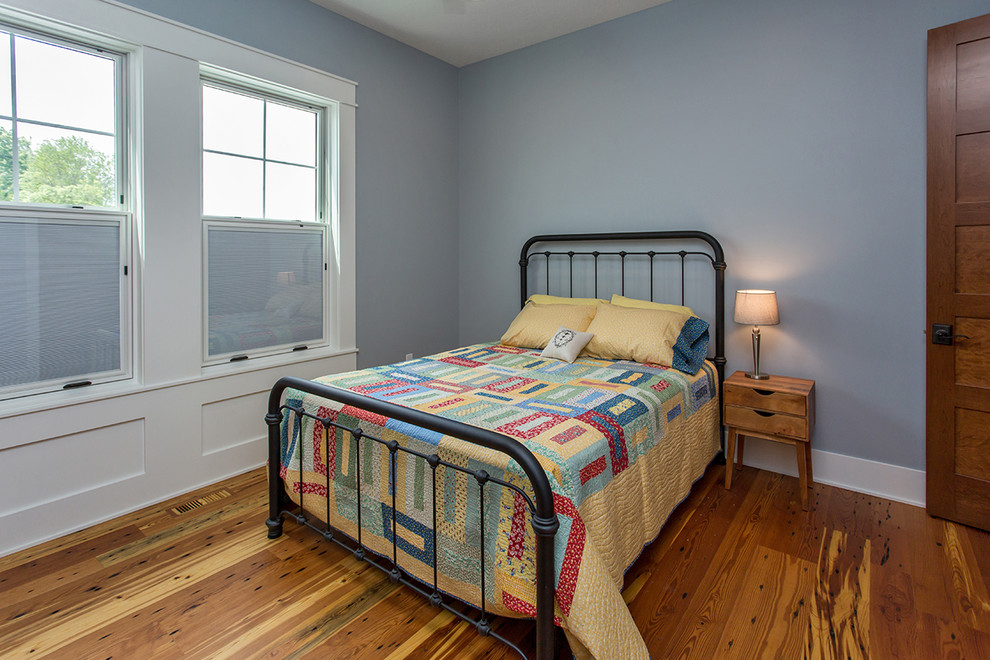 Example of a cottage bedroom design in Other