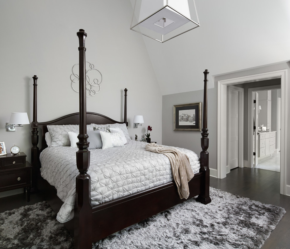 Bedroom - mid-sized transitional master medium tone wood floor bedroom idea in Chicago with gray walls