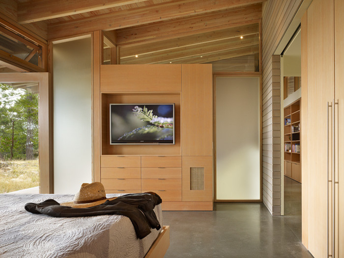 シアトルにあるコンテンポラリースタイルのおしゃれな主寝室 (グレーの壁、コンクリートの床) のレイアウト
