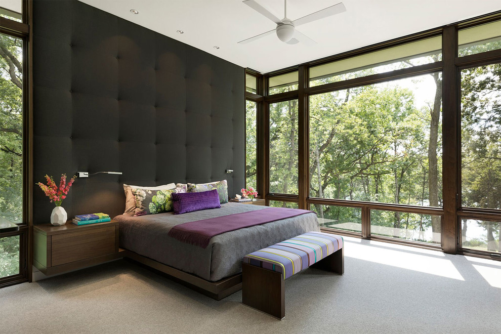 Idéer för funkis sovrum, med heltäckningsmatta och grått golv