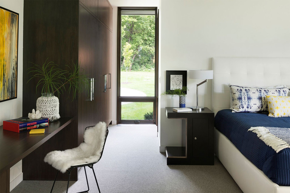 Example of a trendy carpeted and gray floor bedroom design in Minneapolis with white walls