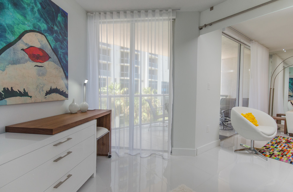 Bedroom - mid-sized modern guest porcelain tile bedroom idea in Miami with white walls