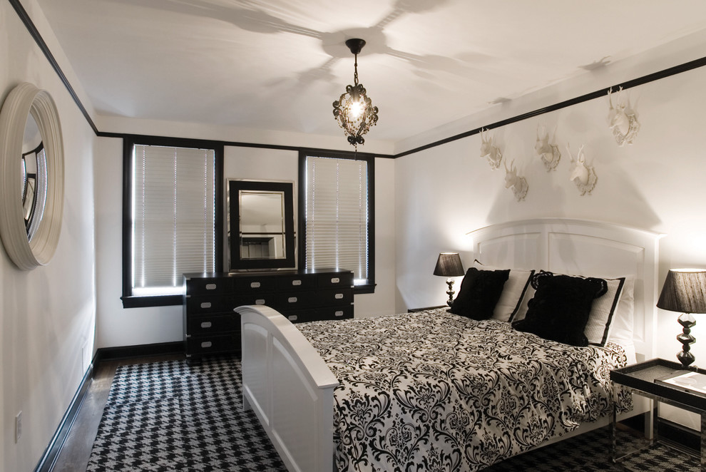 Trendy dark wood floor bedroom photo in DC Metro with white walls and no fireplace