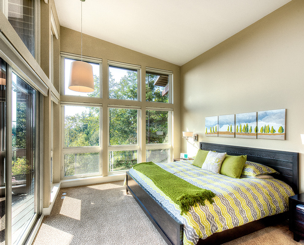 Bedroom - contemporary master carpeted bedroom idea in Seattle with green walls