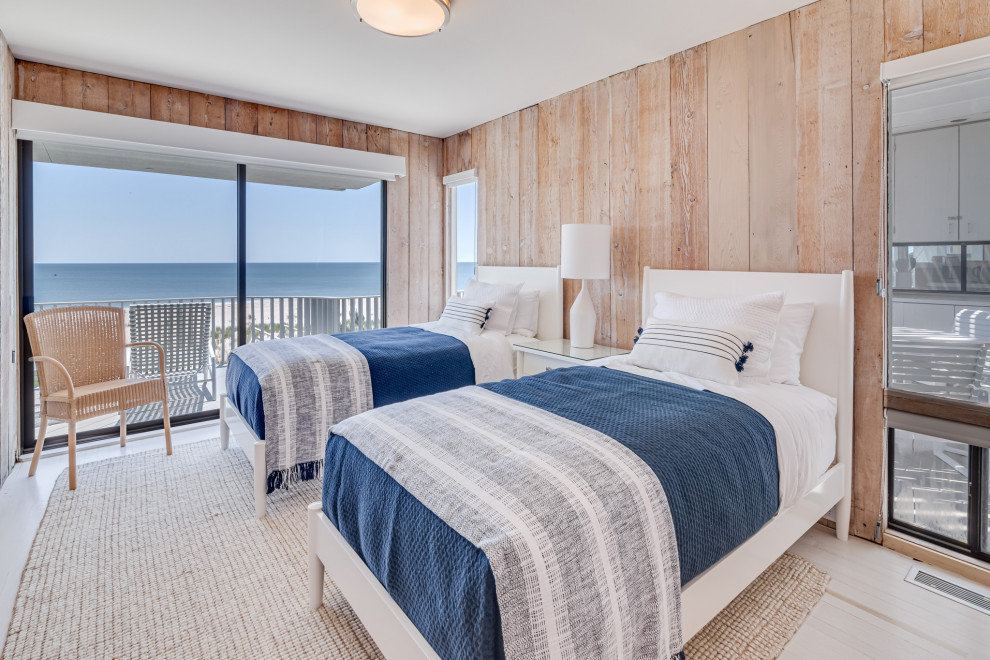 Bedroom - coastal guest light wood floor and beige floor bedroom idea in New York with brown walls and no fireplace