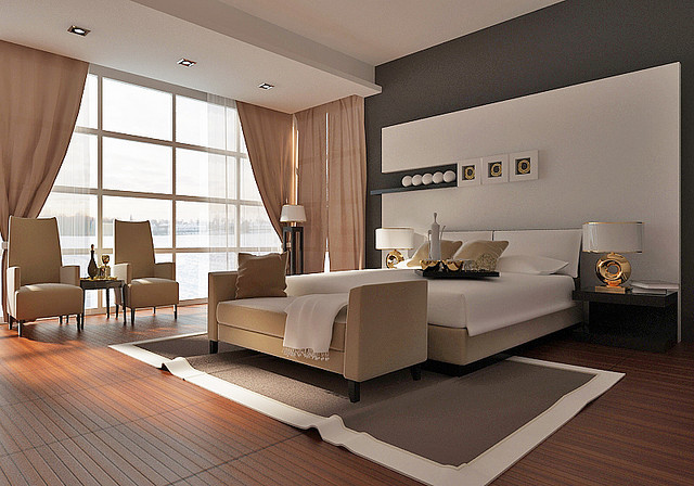 Imagen de dormitorio principal moderno grande sin chimenea con paredes marrones y suelo de madera en tonos medios