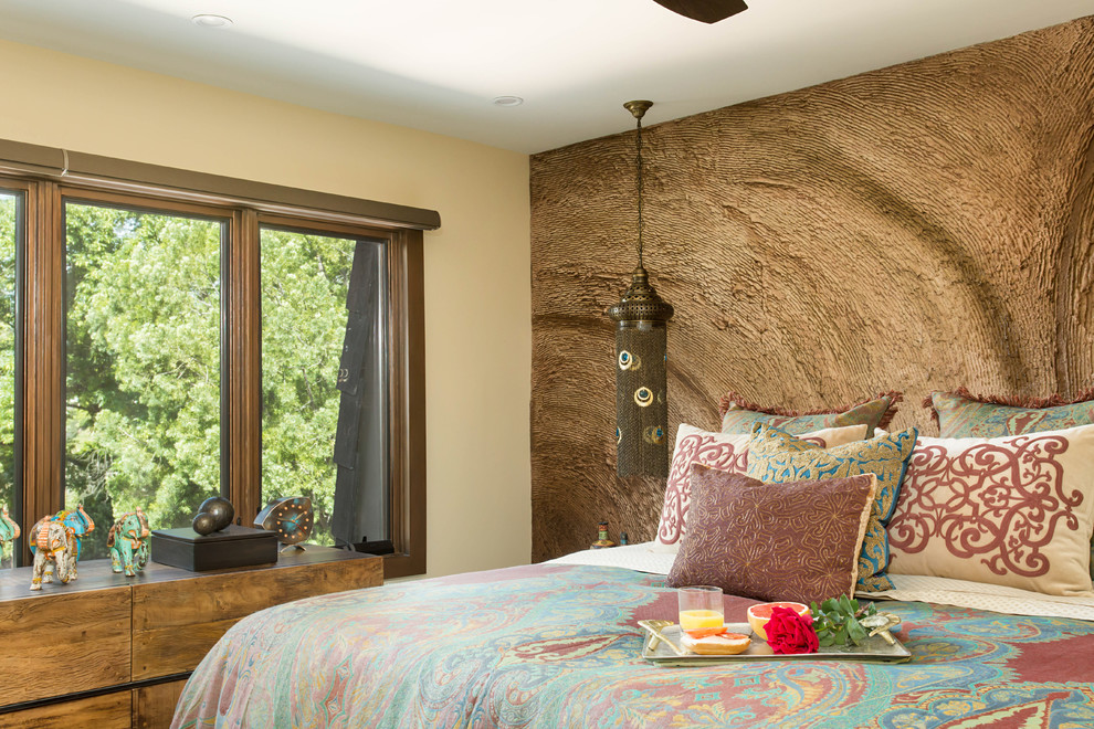 Bedroom - mid-sized mediterranean master light wood floor and beige floor bedroom idea in Los Angeles with beige walls