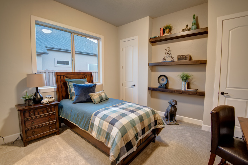Photo of a small traditional guest bedroom in Boise with beige walls, carpet, no fireplace and beige floors.
