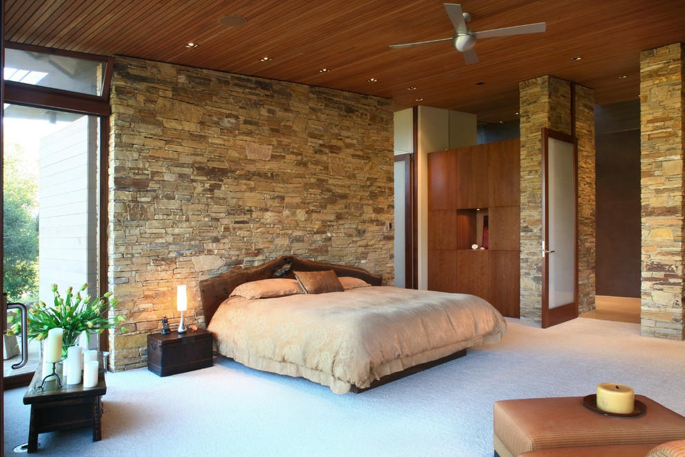 Photo of a modern grey and cream bedroom in Santa Barbara.