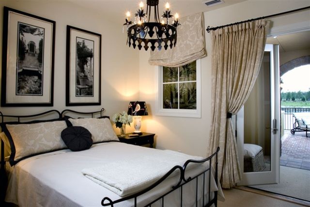 Bedroom - large transitional guest bedroom idea in Miami with white walls and no fireplace