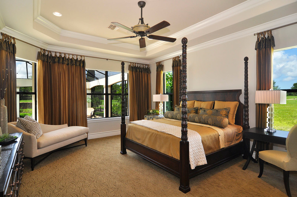 This is an example of a classic master bedroom in Miami with carpet.