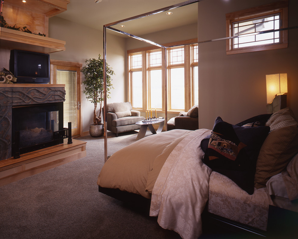 Photo of a large classic master bedroom in Denver.