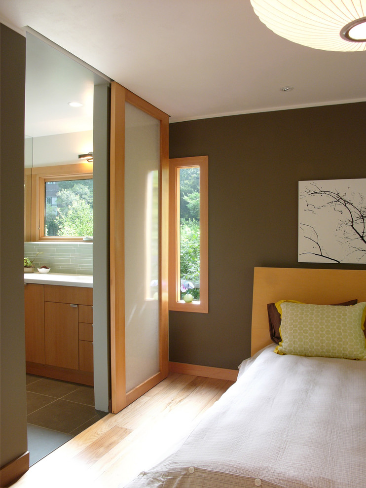 Bedroom - large zen master light wood floor and beige floor bedroom idea in San Francisco with brown walls and no fireplace