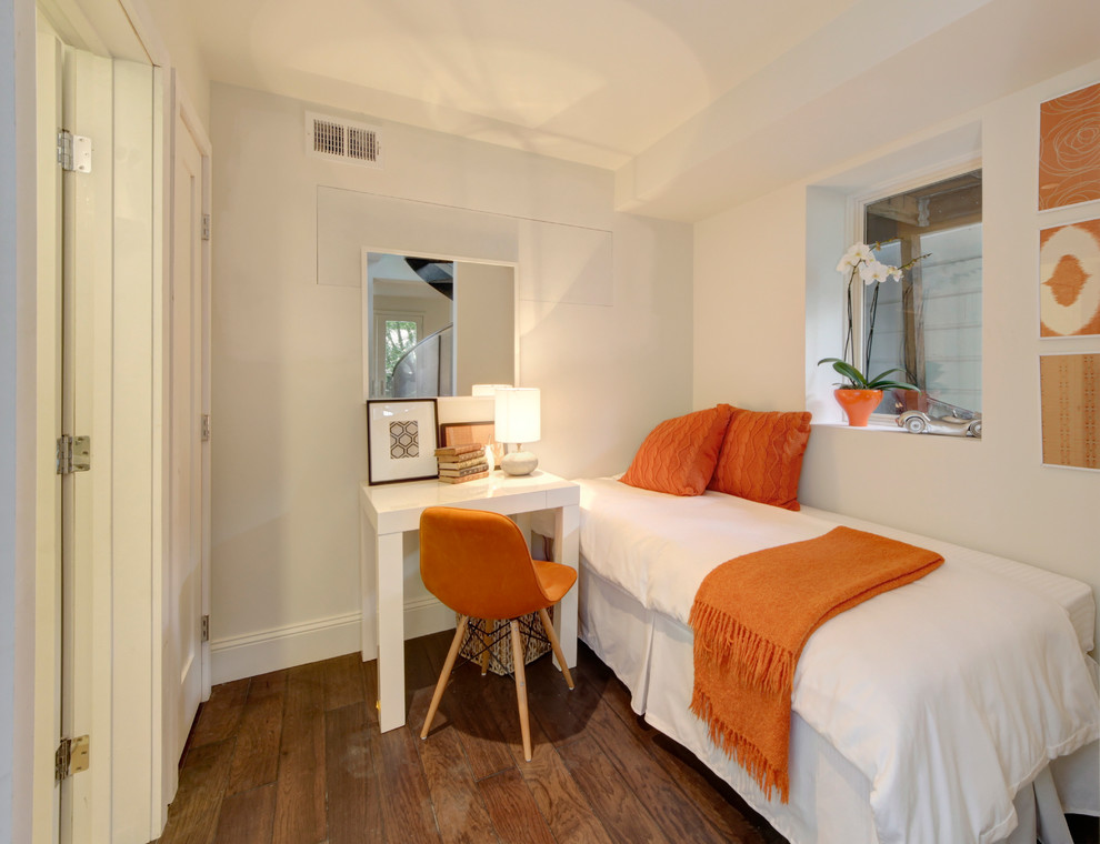 Classic bedroom in San Francisco with white walls and dark hardwood flooring.