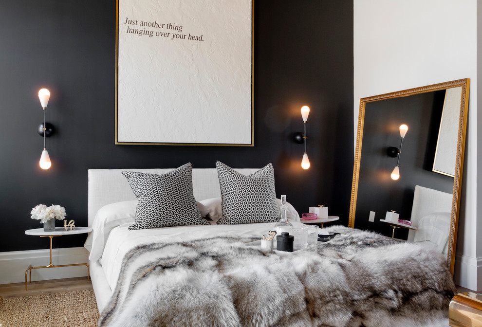 Contemporary bedroom in New York with black walls.