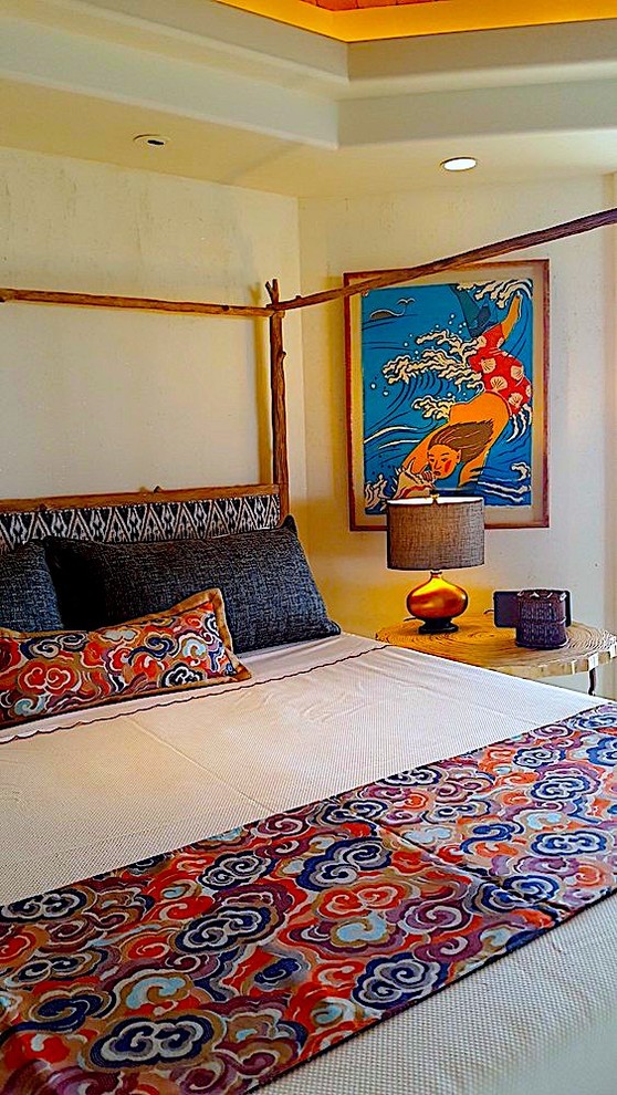 ハワイにあるビーチスタイルのおしゃれな寝室のインテリア
